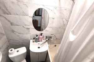 Alex Apartments. White rotunda. 16